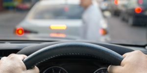 car about to hit a pedestrian in the crosswalk